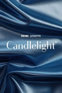 Candlelight promotional image with folded blue satin and the white Candlelight logo